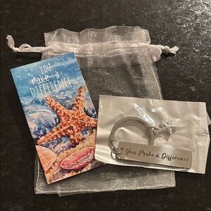 The Starfish Story Silver Keychain with Starfish Charm “You Make a Difference”.